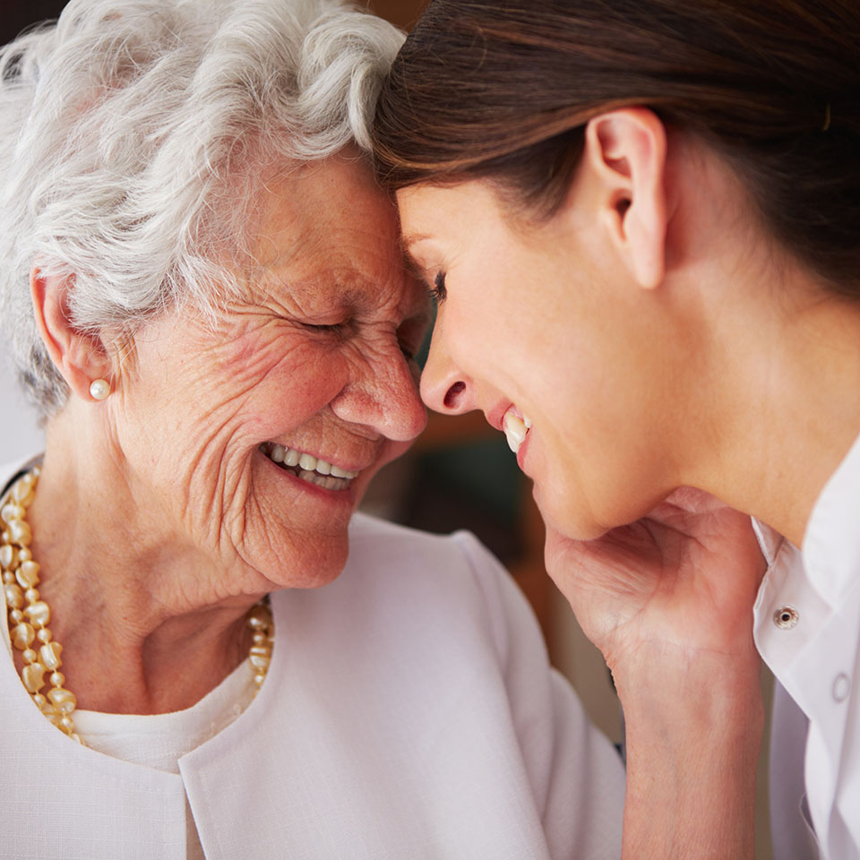 elderly mother and daughter